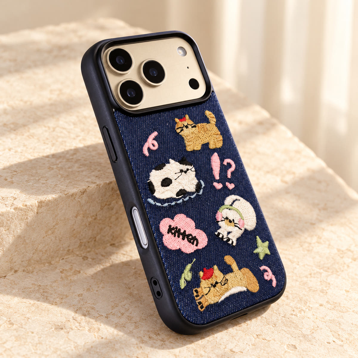 Kawaii Cat Embroidered Denim iPhone case — tabletop portrait view