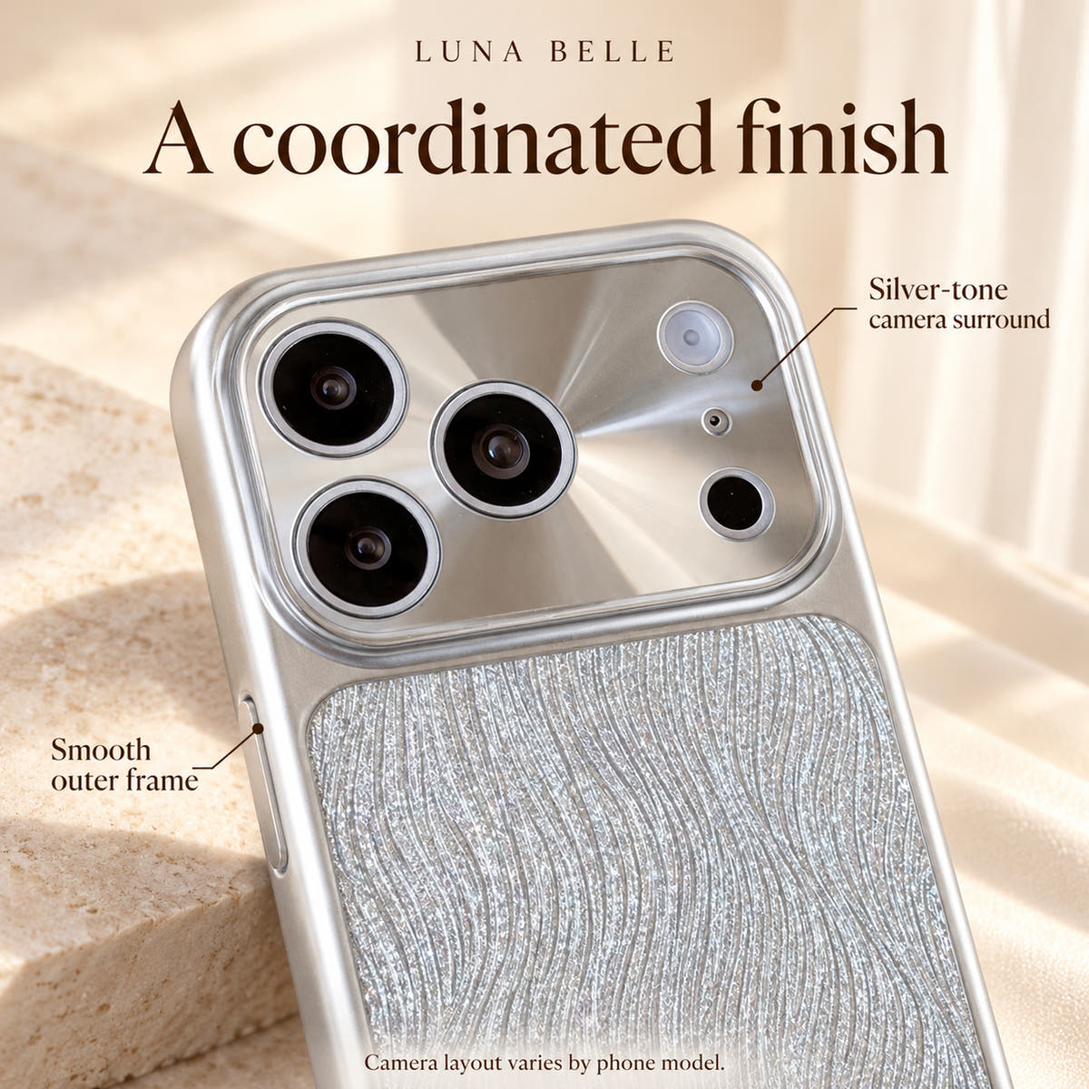 Luna Belle silver-tone camera surround and frame shown in close-up.