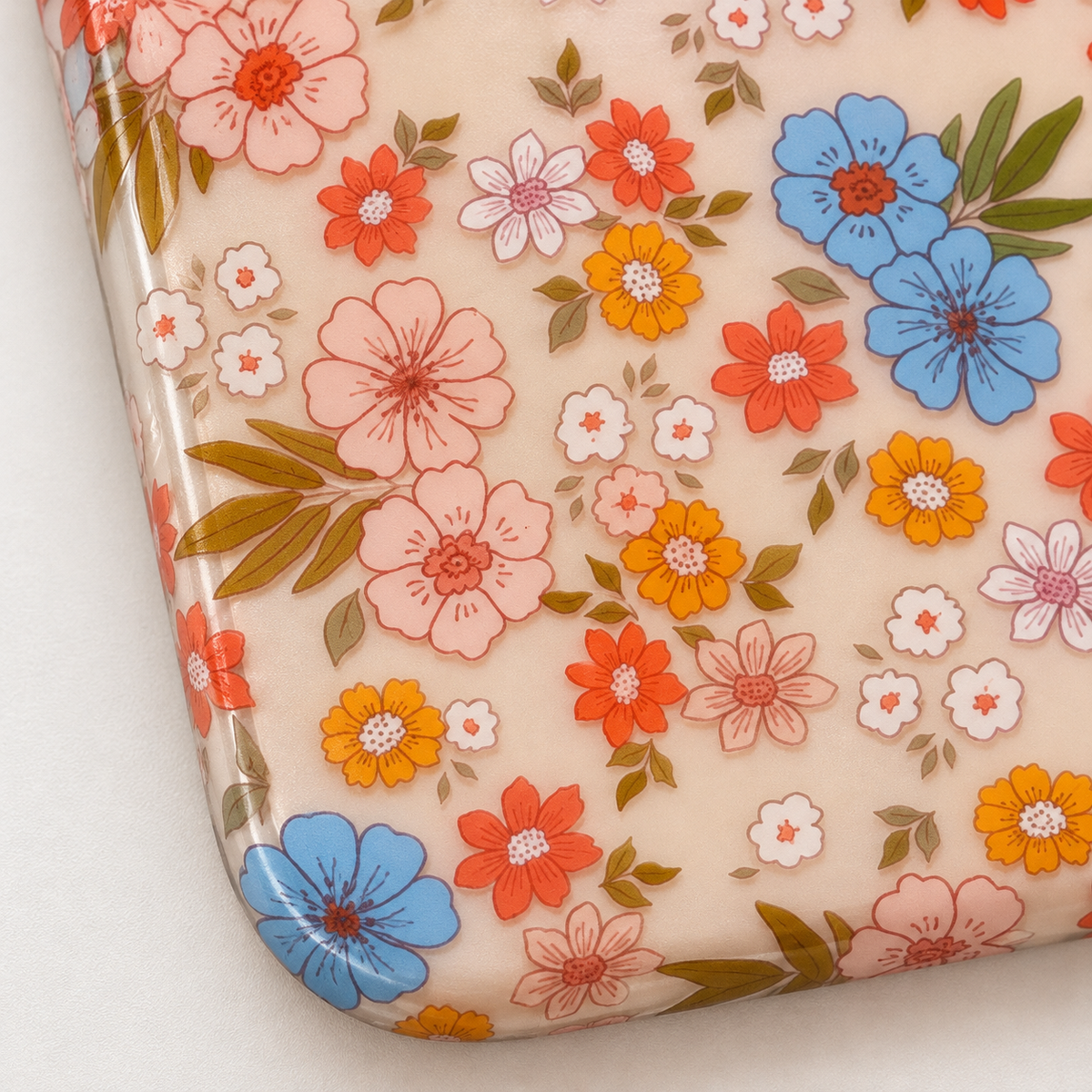 Meadow Floral iPhone case — rounded lower corner and print detail.