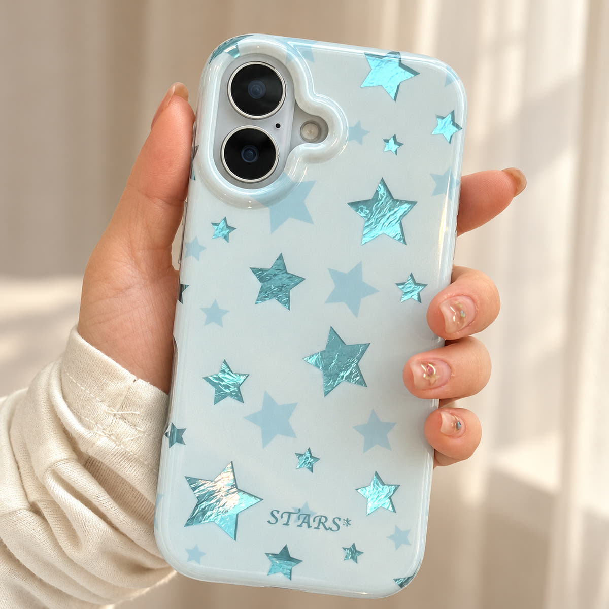 Metallic Dots & Stars iPhone case in Blue — camera detail view