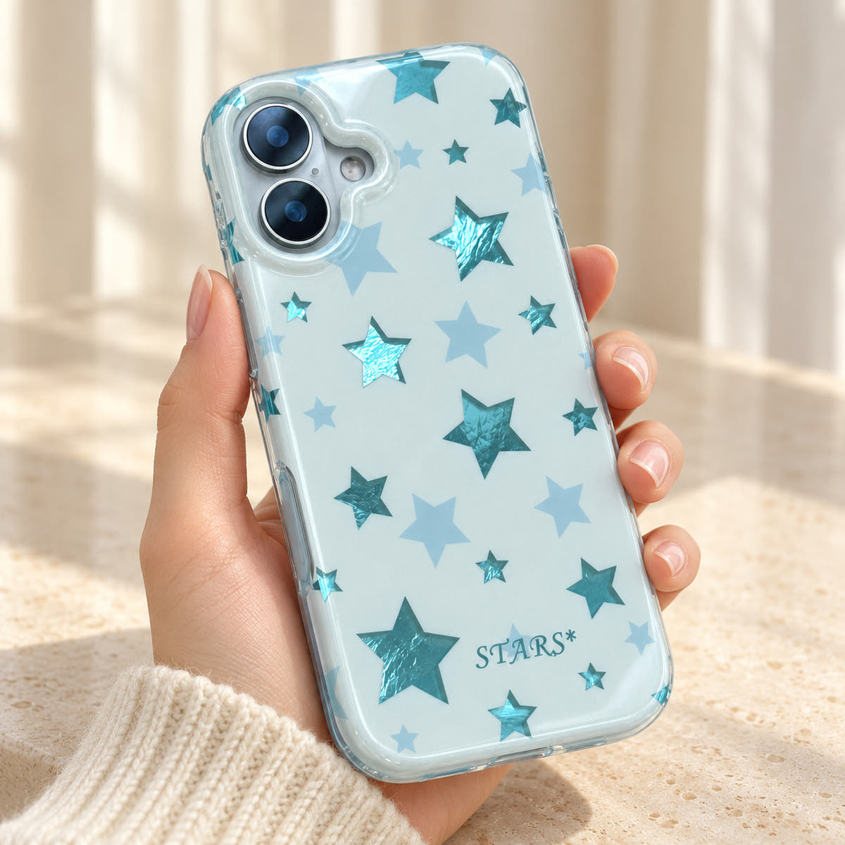 Metallic Dots & Stars iPhone case in Blue — hero view