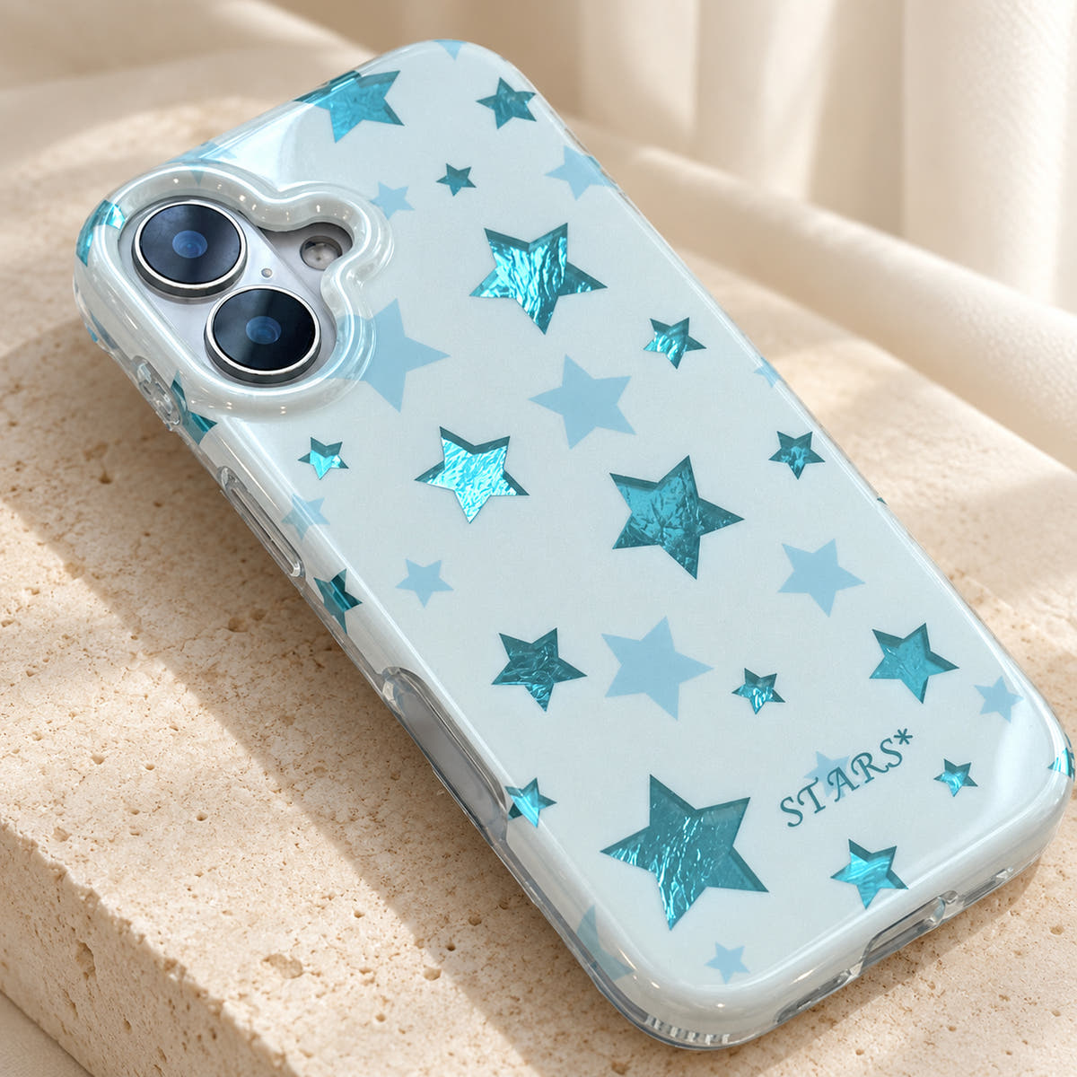 Metallic Dots & Stars iPhone case in Blue — pattern detail view
