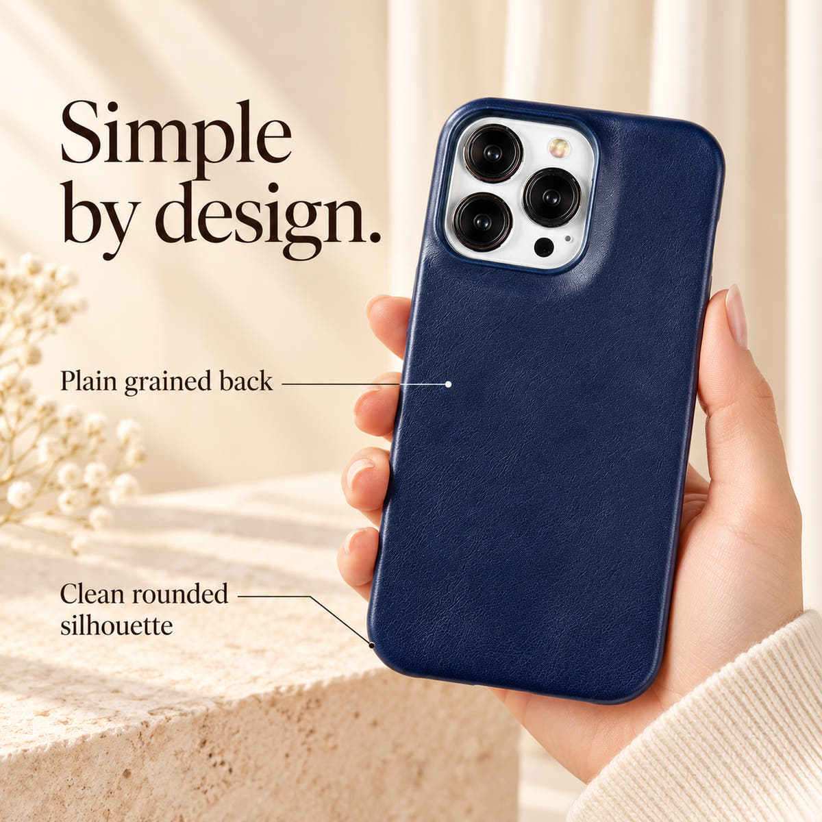 Feature graphic showing the plain navy back and clean rounded silhouette of the minimal leather-look iPhone case.