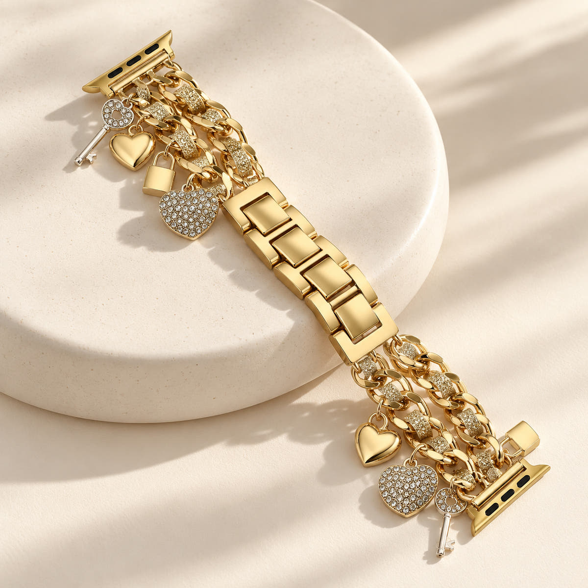 Oskar Hill Amorette Apple Watch charm band — complete charm band styled on an ivory ceramic pedestal