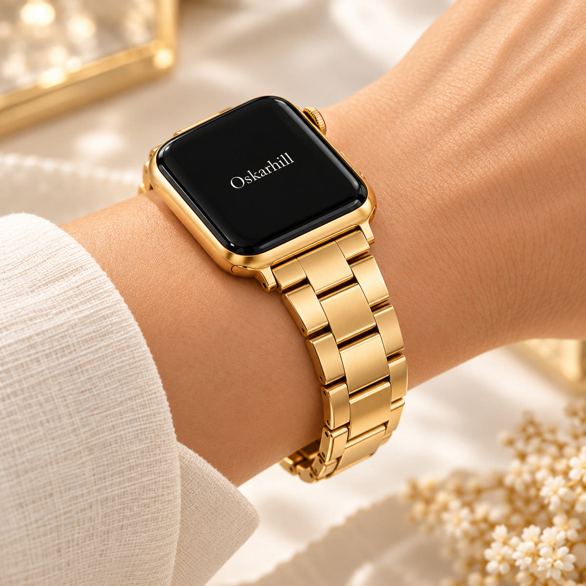 Oskar Hill Florence Gold Flat Link Apple Watch Band on a feminine wrist, side view showing the links