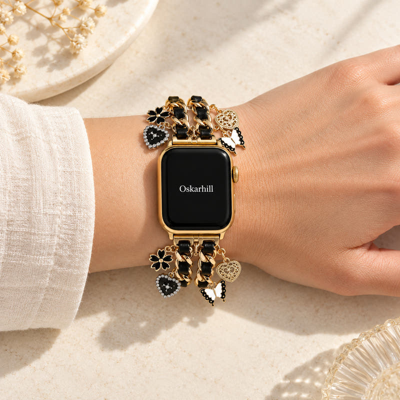 Oskar Hill Rosalie Apple Watch charm band — on a feminine wrist with visible charm details
