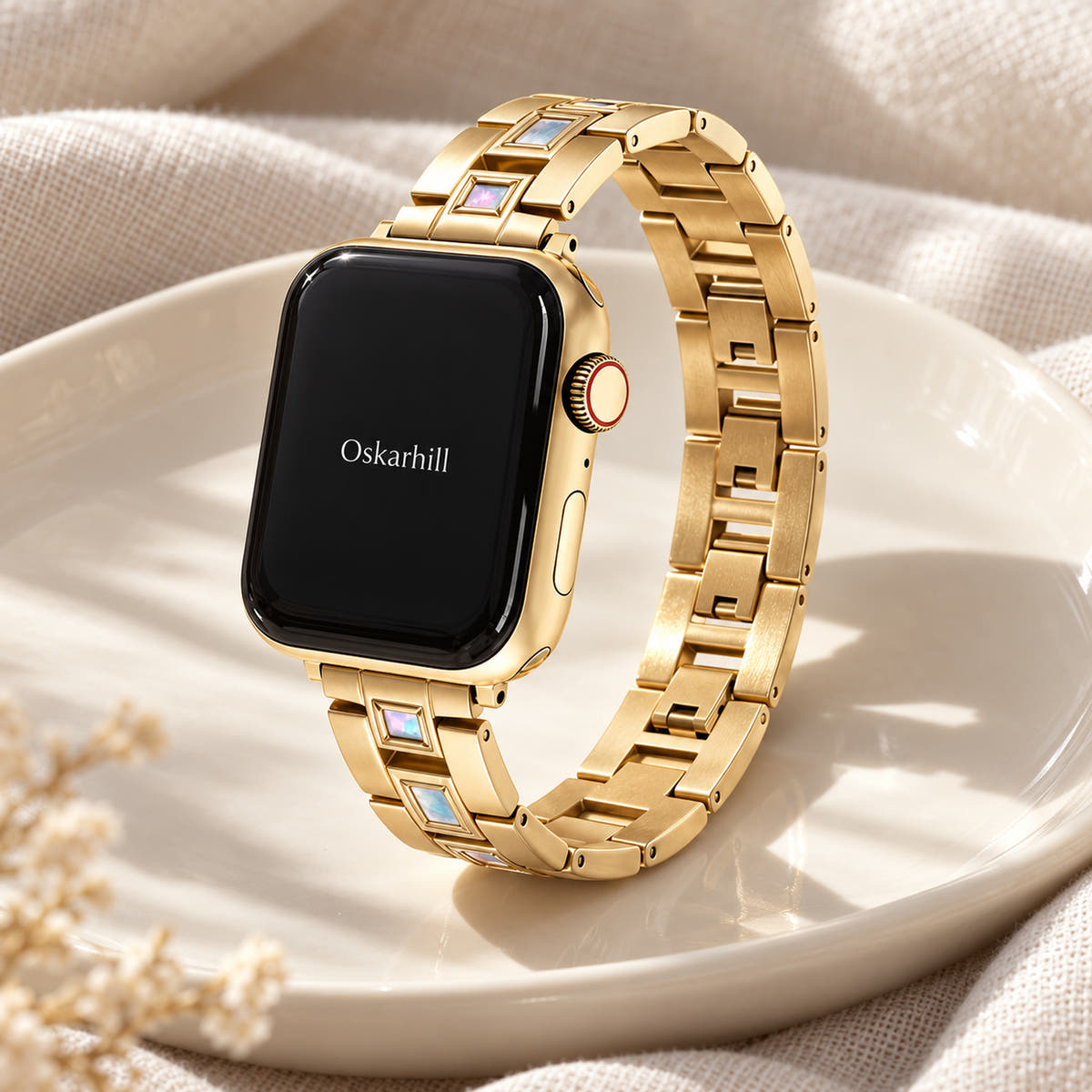 Oskar Hill Seraphine Gold Iridescent Link Apple Watch Band in a closed bracelet profile on porcelain