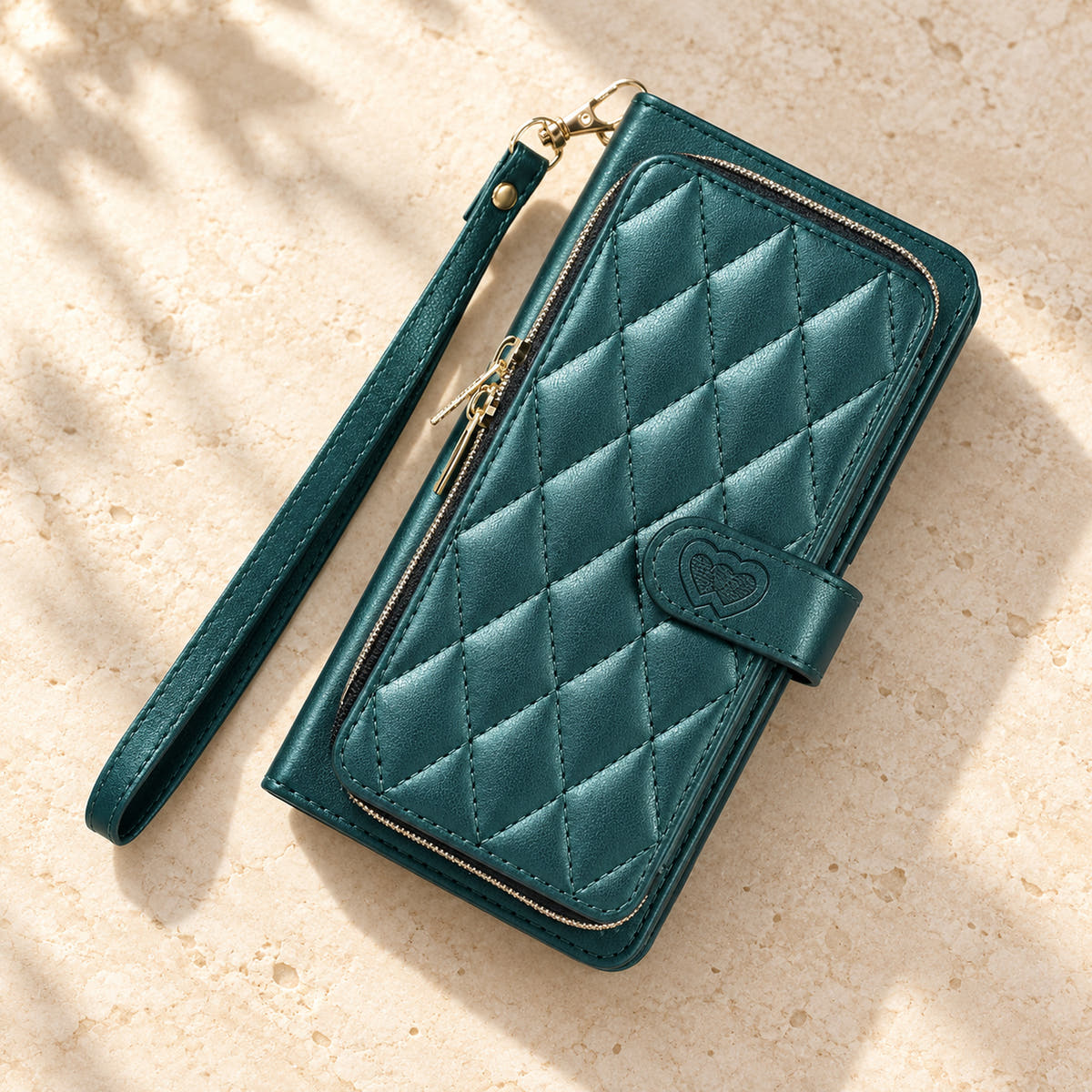 Forest Green padded zip wallet in an angled flat lay showing quilted front and closure