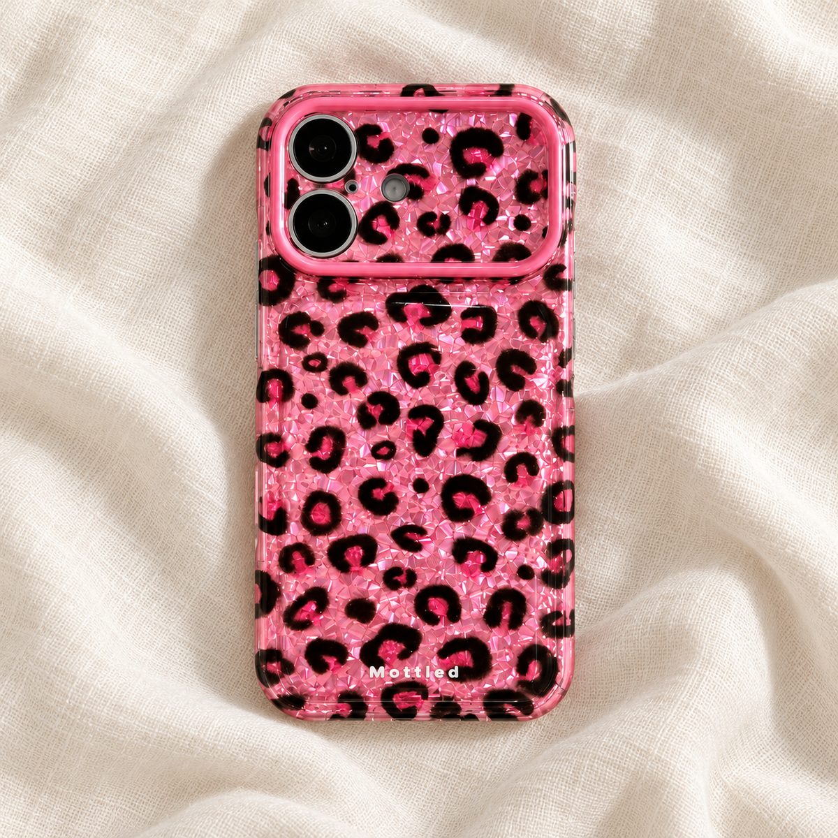 Glitter Leopard iPhone Case in Pink — portrait view on ivory linen
