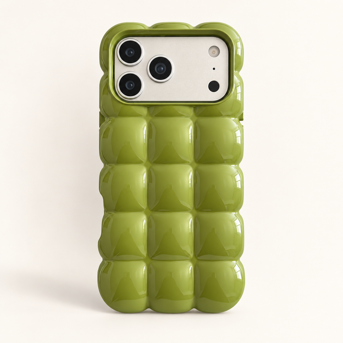 Olive Green puffy grid iPhone case with rounded-square back and scalloped edges — full rear studio view.