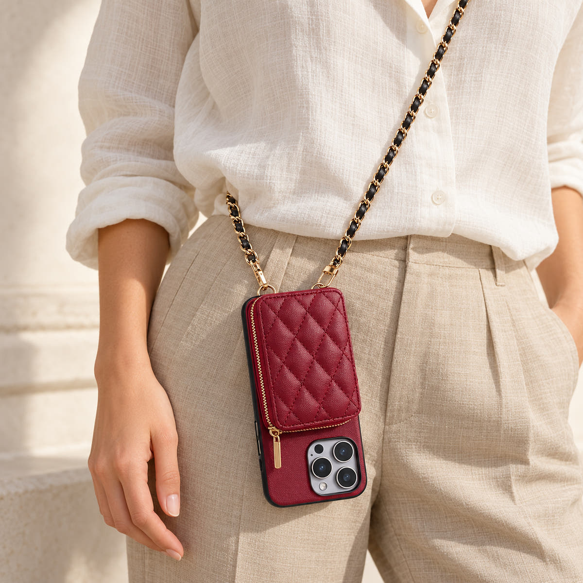 Red quilted iPhone wallet case — crossbody carry with chain attached to the bottom loops