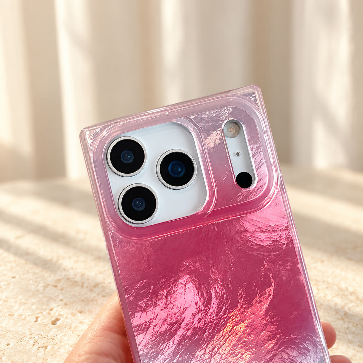 Close view of the Radiant Wave case camera surround and translucent pink edge