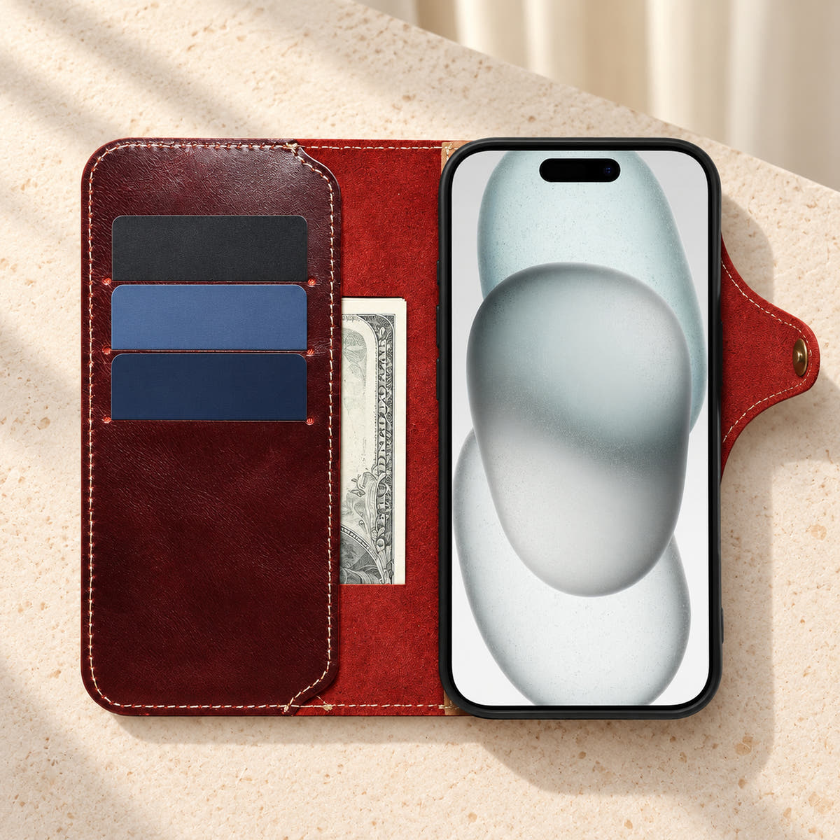 Red iPhone folio wallet opened to show three card slots, a side note pocket and the phone cradle