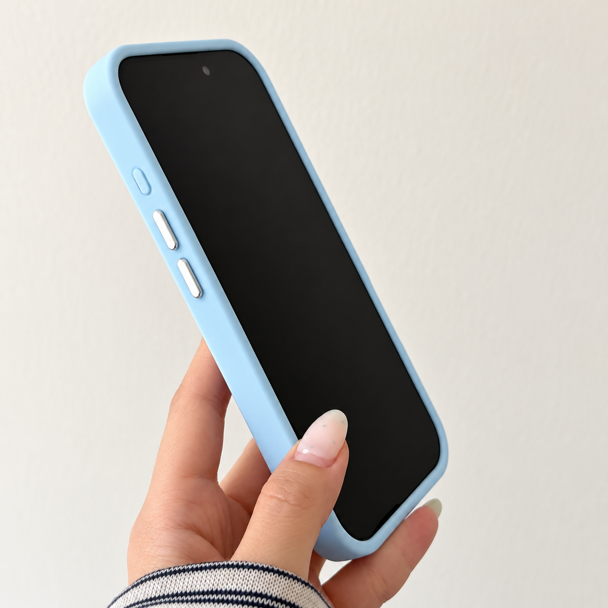 Sky Blue textured heart iPhone case — front and side view showing the coordinated frame.