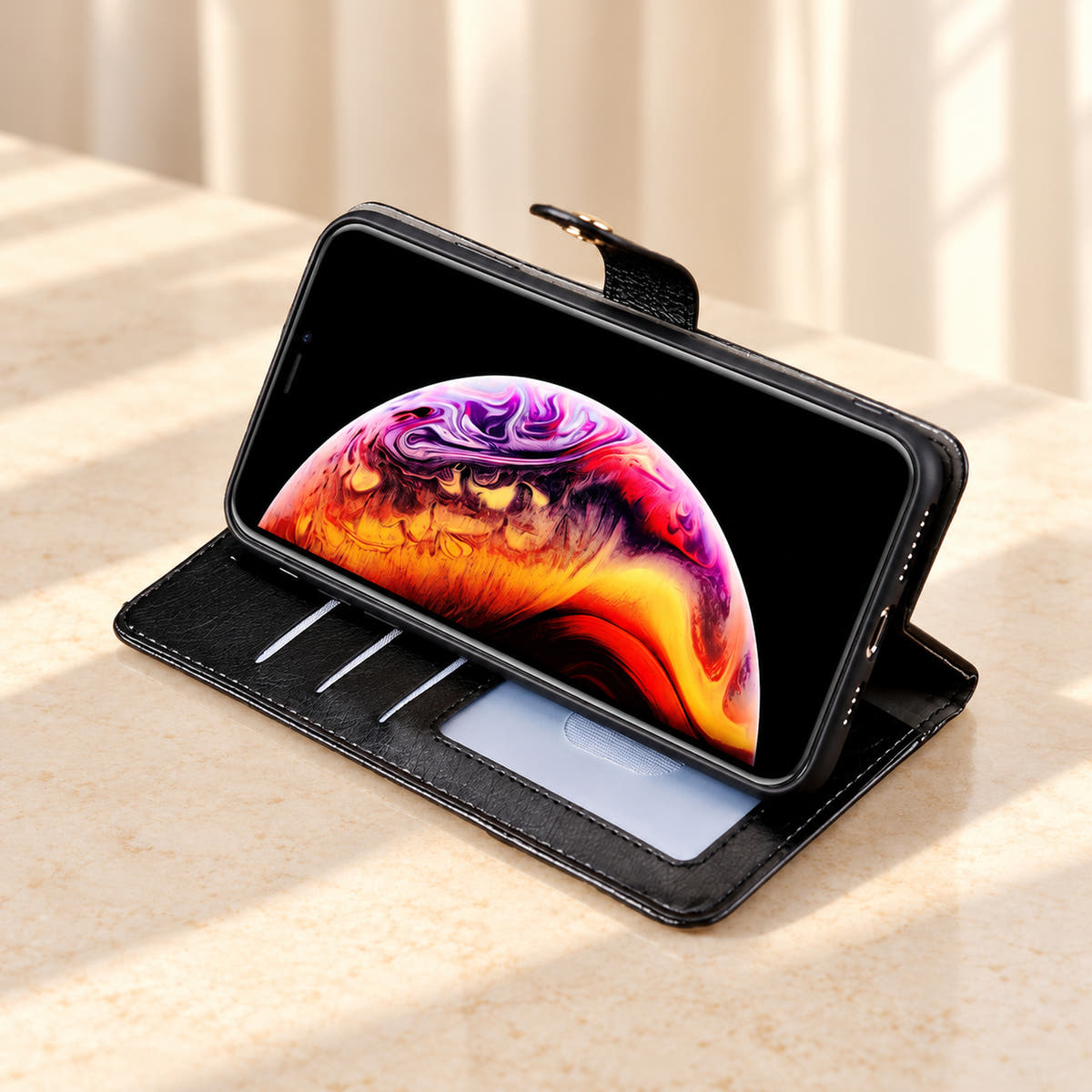Black Valencia Luxe wallet phone case folded into a landscape viewing stand